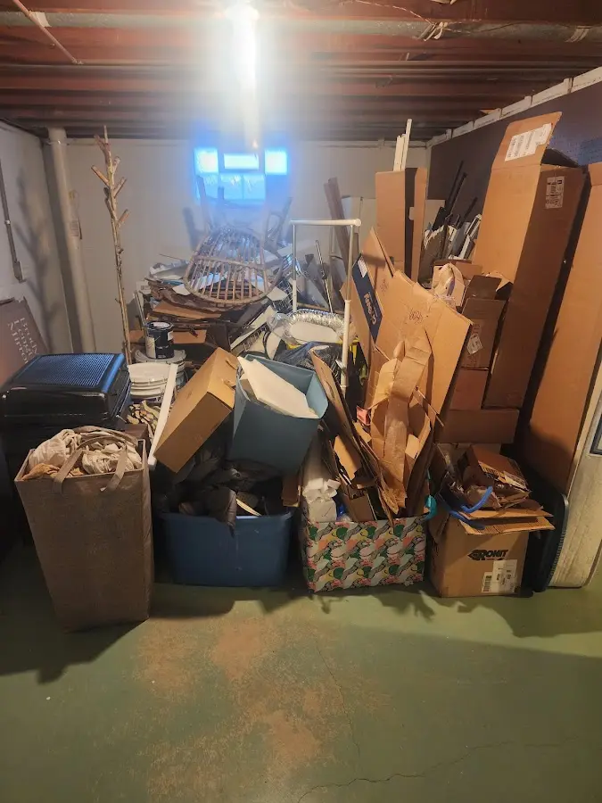 Roll-off dumpster container at job site for 2 Yard Dumpster Rental in Hauula